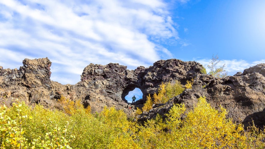 Dimmuborgir Lava Formations near Lake Myvatn in North Iceland, with natural rock arch and volcanic landscape.