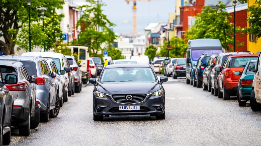 Cars parked in Skolavordustigur, where you have to pay for parking in Reykjavik, making the EasyPark app a good choice for visitors