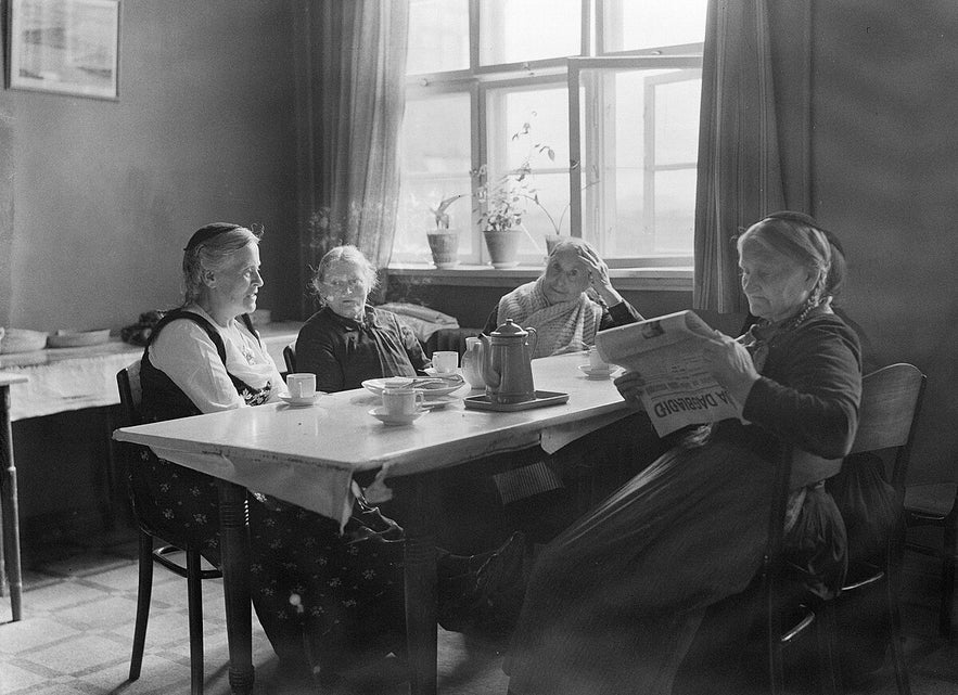 Elderly women sit around a table drinking coffee at the Elliheimilid Grund nursing home in Reykjavik. Elderly women sit around a table drinking coffee at the Elliheimilid Grund nursing home in Reykjavik.