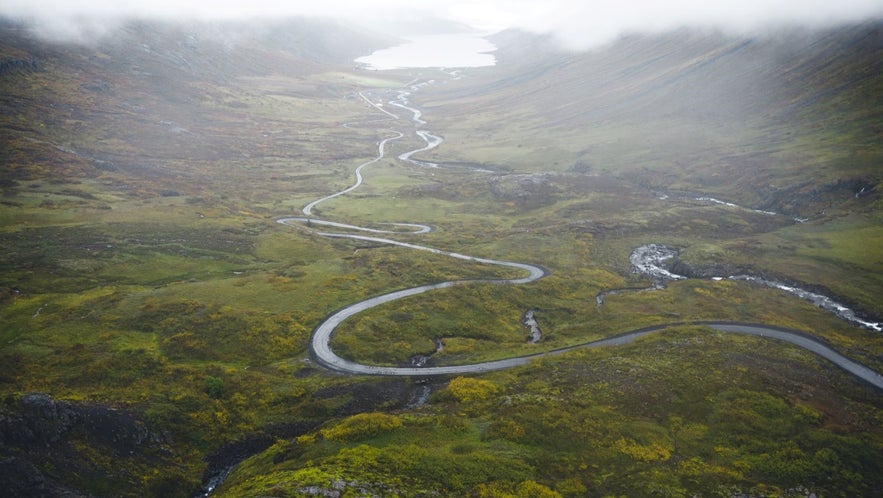 A winding mountain road in the country side of Iceland