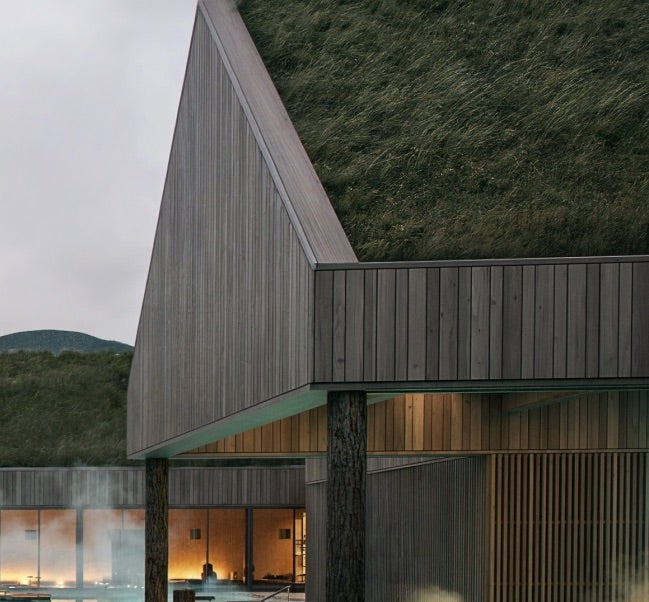 A turf roof on one of the buildings at Reykjabod Hot Springs. 