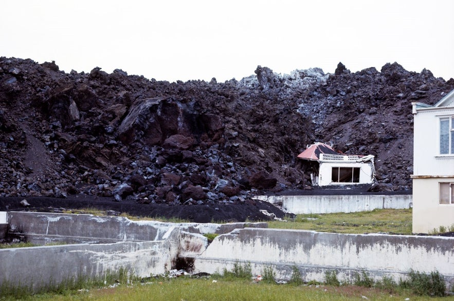 Over 400 houses were covered in lava and a further 400 were damaged in the 1973 eruption Over 400 houses were covered in lava and a further 400 were damaged in the 1973 eruption