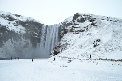 Icy plains add allure to the beauty of the Skogafoss waterfall in the South Coast.