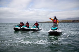 Feel the thrill of jet skiing through Reykjavik Bay's captivating waters on a guided two-hour tour.