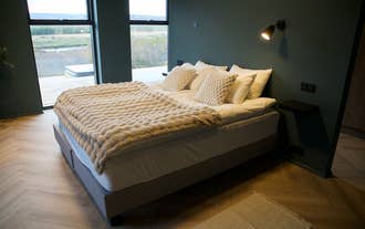 Private bedroom at Golden Circle Luxury Villa designed for families and groups.