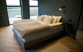 Private bedroom at Golden Circle Luxury Villa designed for families and groups.