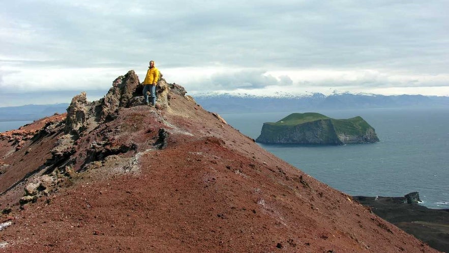 Hiking to the top of Eldfell in the Westman Islands is one of the best things to do there, providing a stunning view of the archipelago Hiking to the top of Eldfell in the Westman Islands is one of the best things to do there, providing a stunning view of the archipelago