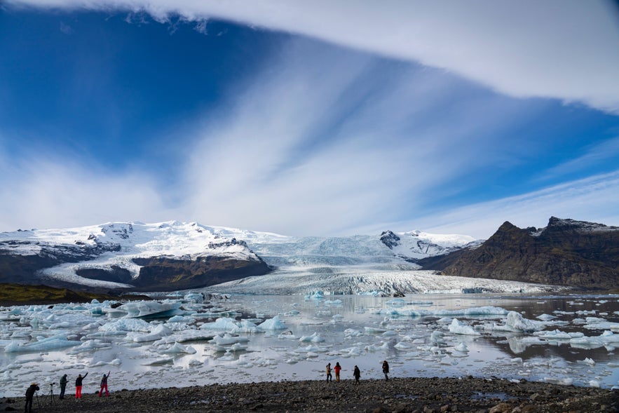 Fjallsarlon Glacier Lagoon under dramatic sky.