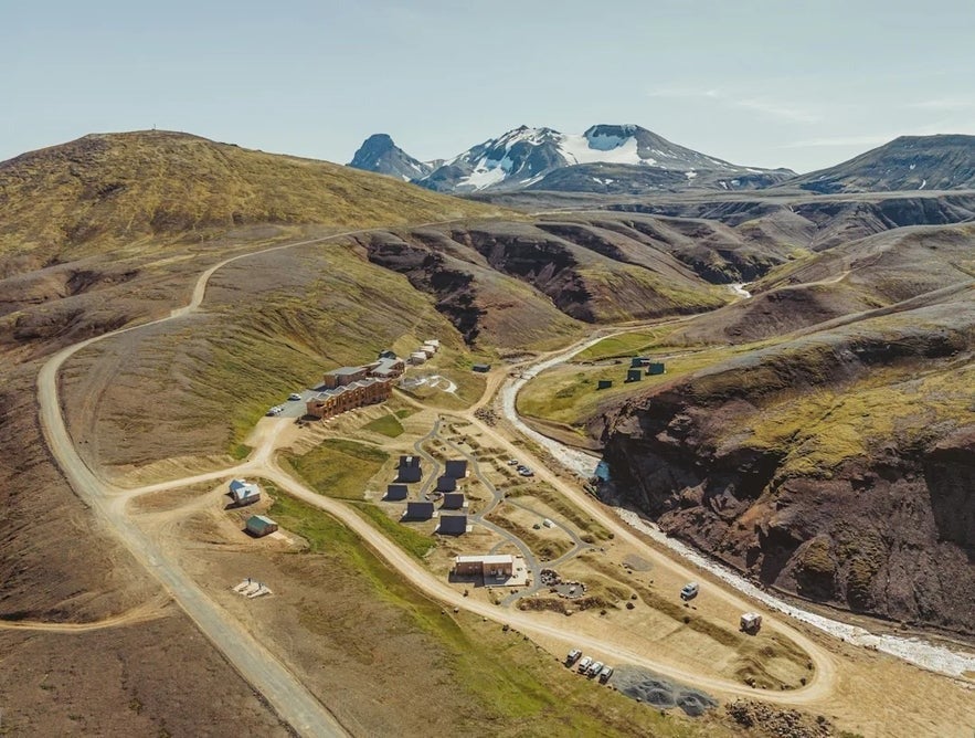 Aerial view of Kerlingarfjoll Highland Base near Hveradalir, Iceland Highlands, with lodges, F347 road, and mountain terrain.