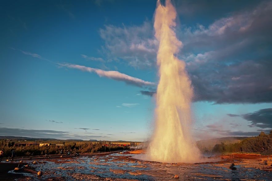 Strokkur geyser erupting in Haukadalur Geothermal Valley, Iceland.