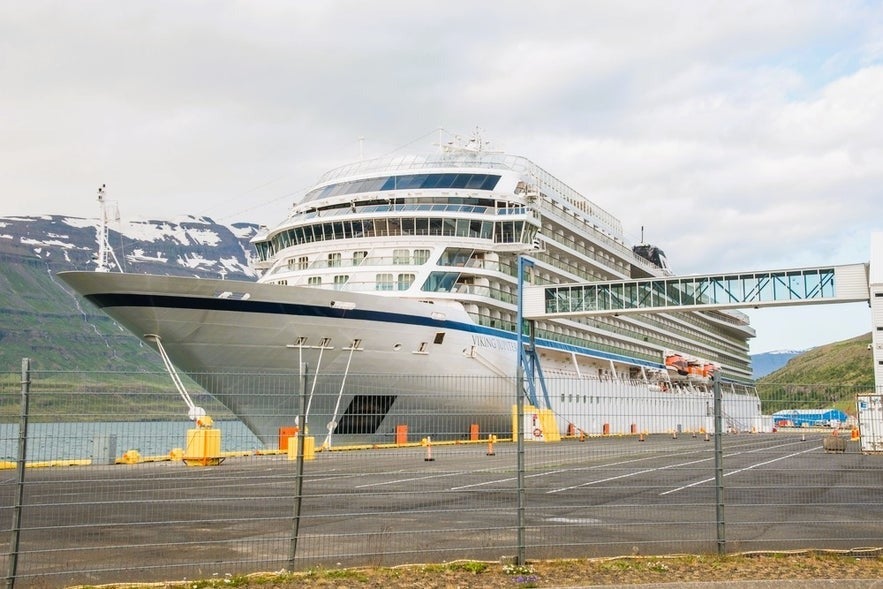Cruise ship docked at Seydisfjordur Port, East Iceland, gateway for shore excursions in Iceland to waterfalls and Studlagil Canyon.
