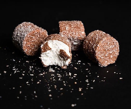 Icelandic candy kokosbolla with coconut-covered chocolate marshmallow treats, a traditional Icelandic sweet.
