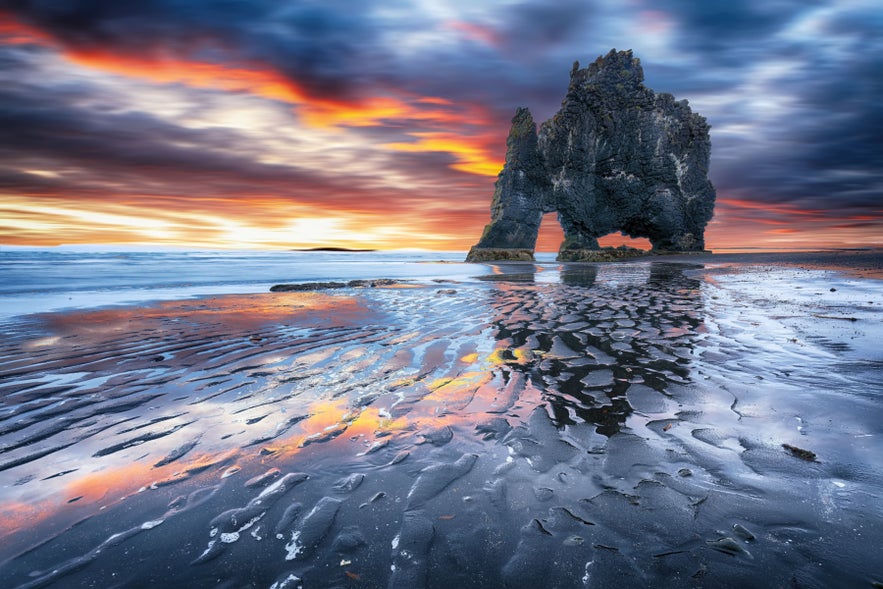 Dramatic sunset behind Hvitserkur Rock on the Vatnsnes Peninsula, Iceland.