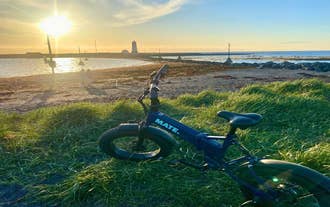 Electric bike parked along a scenic cycling path near Ellidardalur Valley in Reykjavik Iceland.