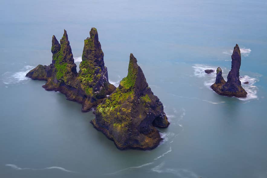 Reynisdrangar sea stacks near Vik, the kind of Iceland coastline that inspired the world of Berk in How to Train Your Dragon.