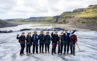 11 Hour South Coast Tour with Glacier Hiking, Waterfalls & Black Sands with Transfer from Reykjavik