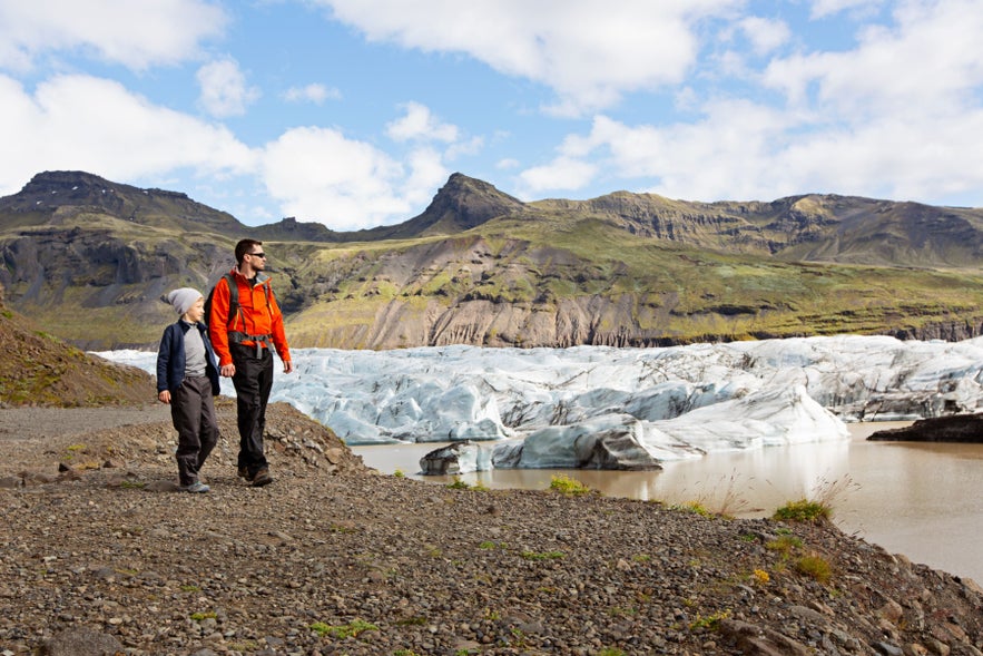 Iceland with kids exploring Fjallsarlon Glacier lagoon in Vatnajokull National Park on the South Coast. Iceland with kids exploring Fjallsarlon Glacier lagoon in Vatnajokull National Park on the South Coast.