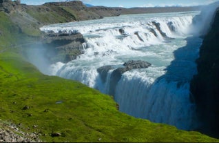 Experience the grandeur of gulfoss waterfall on our comfy SUV adventure.