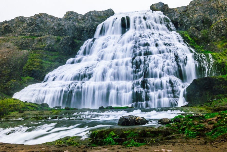 Dynjandi is a breathtaking waterfall backdrop for an Iceland wedding in the Westfjords. Dynjandi is a breathtaking waterfall backdrop for an Iceland wedding in the Westfjords.