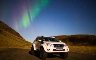 Chase the elusive northern lights under Iceland's starry skies.
