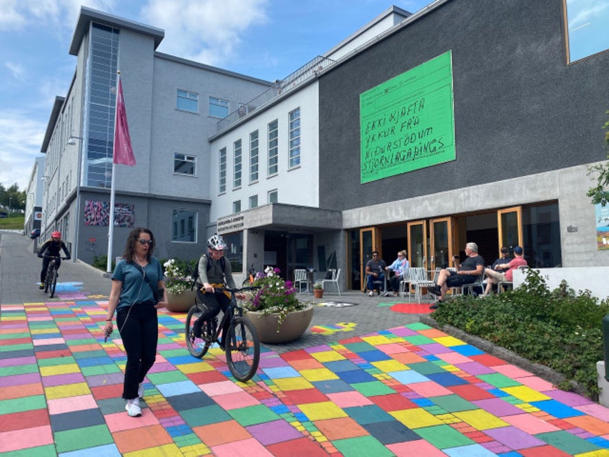 The entrance of the Akureyri Art Museum is characterized by a charming seating area