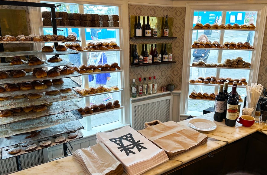 Bakabaka bakery display in Reykjavik with shelves of fresh pastries and bread by the window