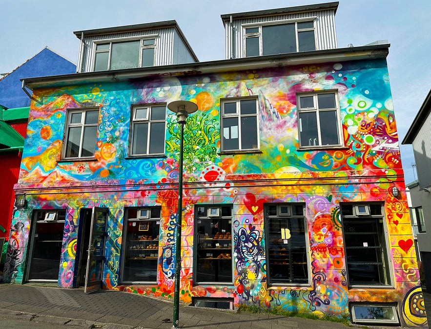 Colorful street art exterior of Brau&eth; & Co bakery in Reykjav&iacute;k, Iceland, known for its sourdough bread and pastries