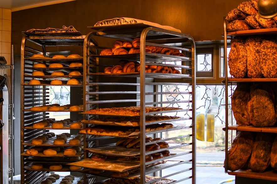 The interior of Braud & Co with its signature stack of trays filled with freshly baked pastries and bread