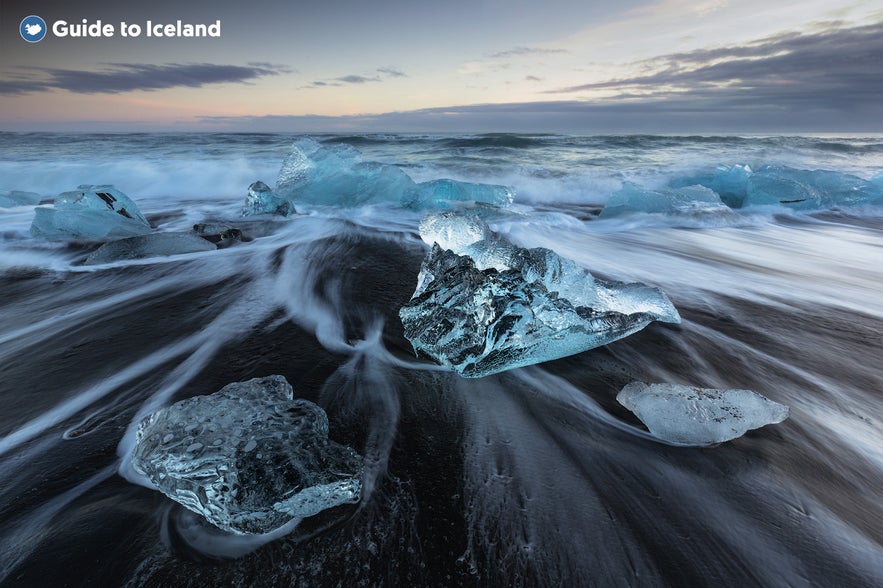 Ice from Jokulsarlon Glacier Lagoon gathered at the Diamond Beach.