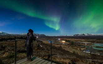 Northern lights above Thingvellir National Park on the Golden Circle route.