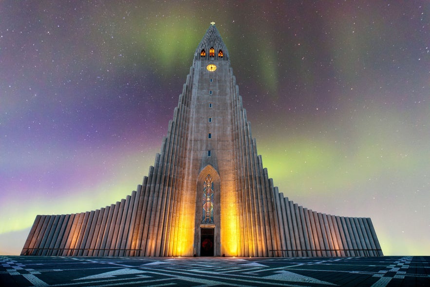 Hallgrimskirkja Church under Northern Lights in Reykjavik, Iceland