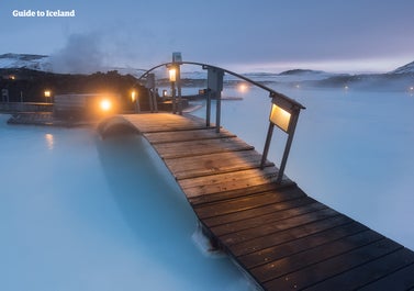 A wooden bridge over the Blue Lagoon geothermal spa.