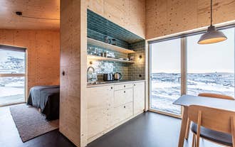 Nature's beauty, modern convenience - enjoy both in this kitchenette.