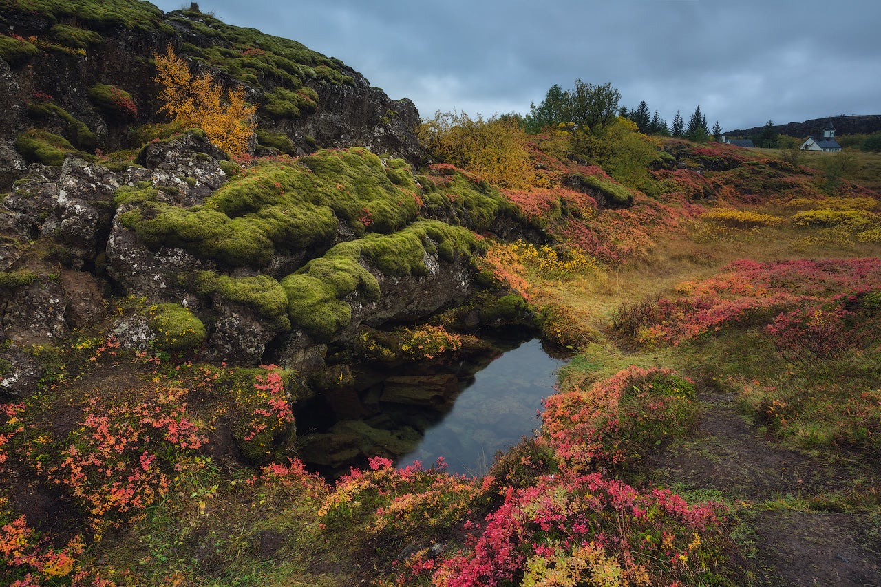 Golden Circle's Thingvellir National Park is swarmed by lush valleys and unique geological formations.