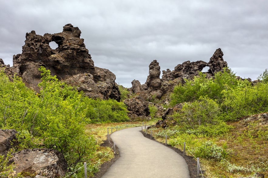 Walking path through Dimmuborgir Lava Formations near Lake Myvatn in North Iceland, a top Diamond Circle attraction.