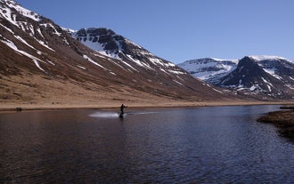 The alpine lake near Sudureyri is perfect for wakeboarding and waterskiing tours.