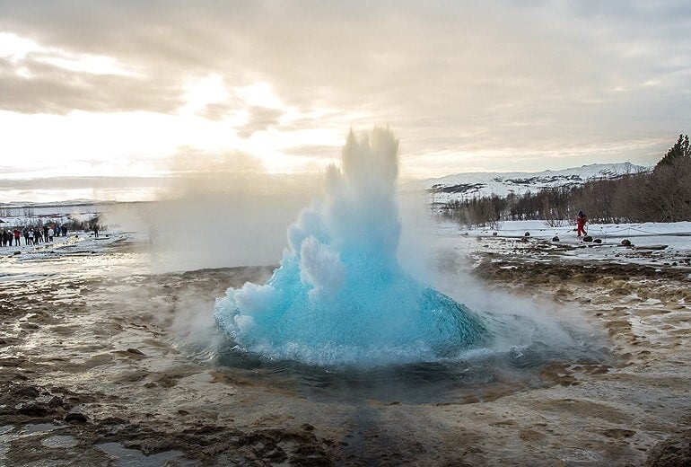 The Strokkur geyser in the Geysir geothermal area erupting.