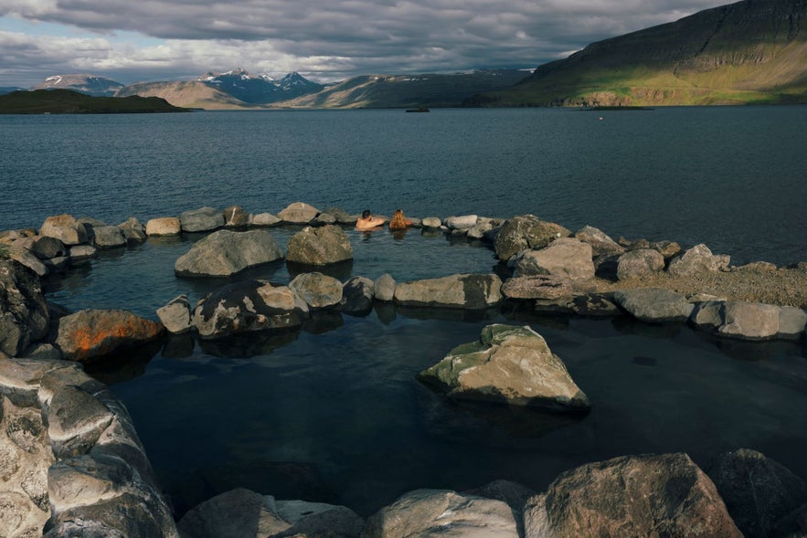 Geothermal pools at Hvammsvik in Hvalfjordur are among the hidden gems in Iceland, set on the shoreline with views across the fjord.
