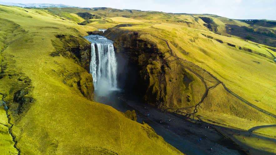 Skogafoss Waterfall near Skogar, a major landmark on the Fimmvorduhals hike extension of the Laugavegur Trail in Iceland. Skogafoss Waterfall near Skogar, a major landmark on the Fimmvorduhals hike extension of the Laugavegur Trail in Iceland.