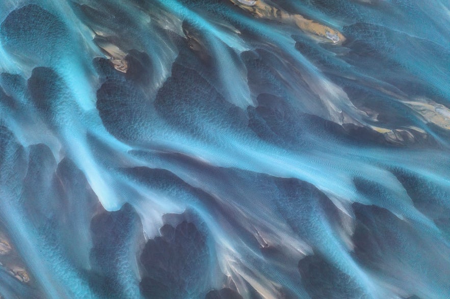 Rivers feature beautiful colors and patterns when seen with a drone