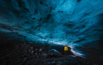 Immerse yourself in the ethereal beauty of the blue ice cave, a natural wonder beneath the heart of Vatnajokull glacier.