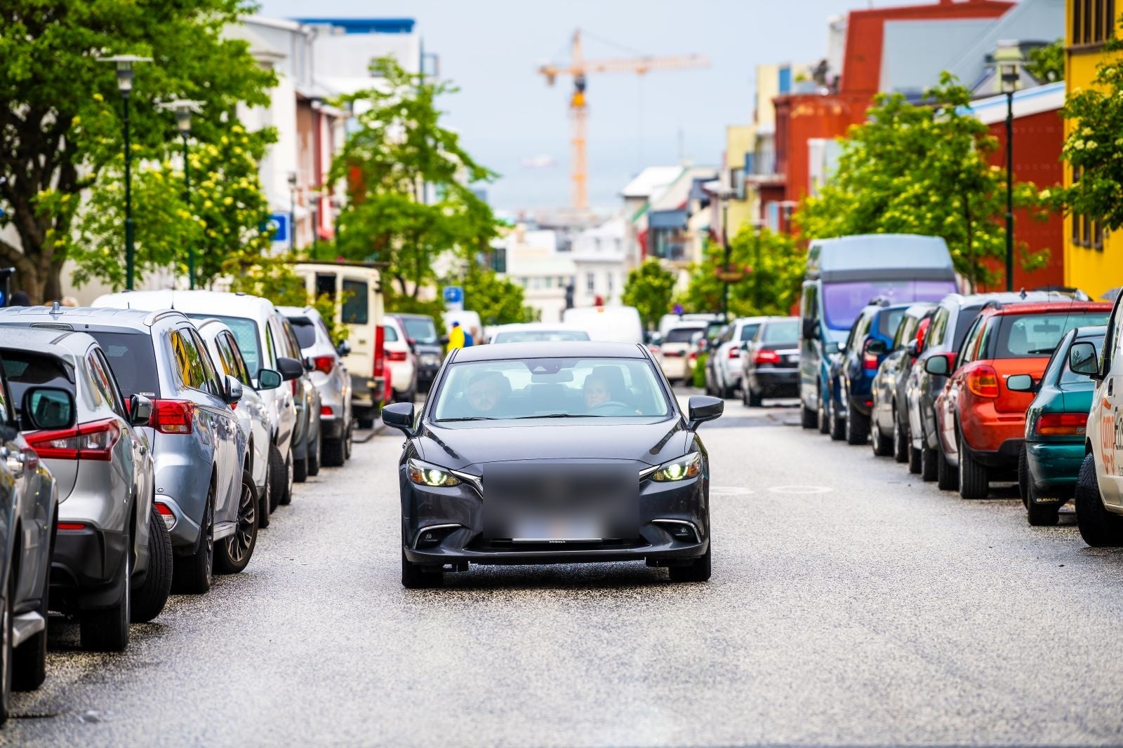 A car in Iceland passing through a street in Reykjavik during a private transfer service from the Blue Lagoon.
