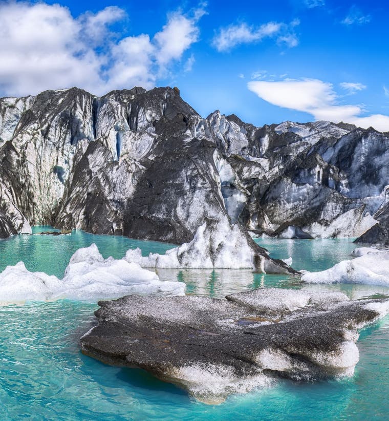 Fantastic view on Solheimajokull glacier in Katla Geopark on Icelandic Atlantic South Coast on a clear summer day.