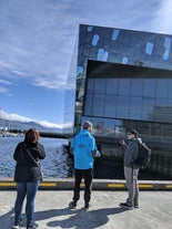 Exploring Reykjavik's iconic landmarks with new friends during the 'Walk With a Viking' city tour.