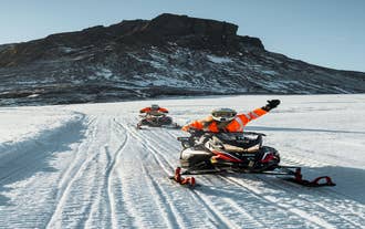 Exciting 4.5-Hour Langjokull Snowmobile and Ice Caving Tour from Geysir