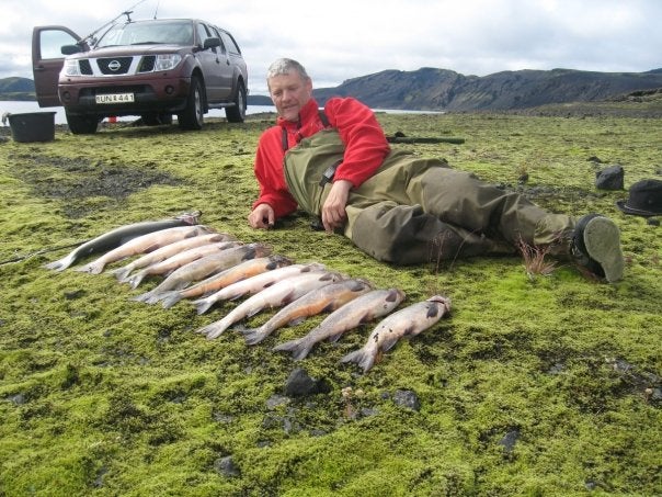 A happy visitor of Lake Langisjor shows off his catch.