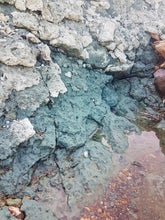 A close-up shot of the green stone at the Graenihryggur ridge.