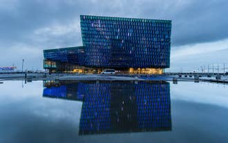 Harpa Concert Hall in Reykjavik on a bright afternoon.