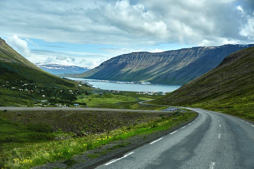 A mountain road to the town of Isafjordur and a view of the fjord