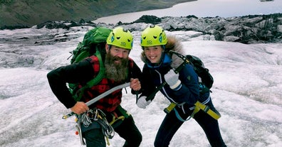 Two people enjoying themselves on the glacier.